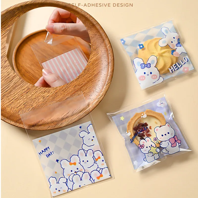 100 قطعة 7x7 سنتيمتر البلاستيك الصغيرة الكرتون الحيوان المطبوعة ذاتية اللصق مخبز التعبئة والتغليف كوكي وجبة خفيفة أكياس الحلوى حفلة عيد ميلاد هدية