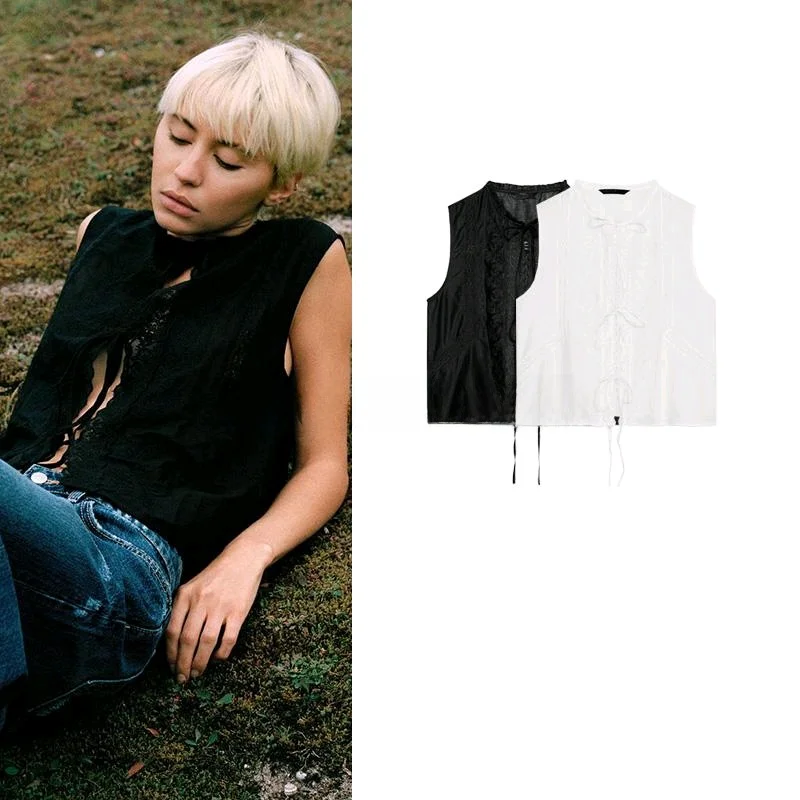 قميص نسائي جديد للربيع بياقة مستديرة وتطريز بدون أكمام مع زخرفة عقدة الفراشة مصنوع من ألياف البوليستر 00٪ بطول عادي