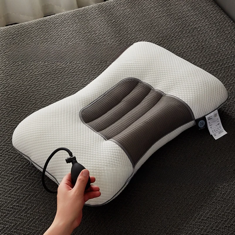 Air-filled pillow with inflatable cushion, designed to support the cervical spine and promote sleep; latex pillow, single size