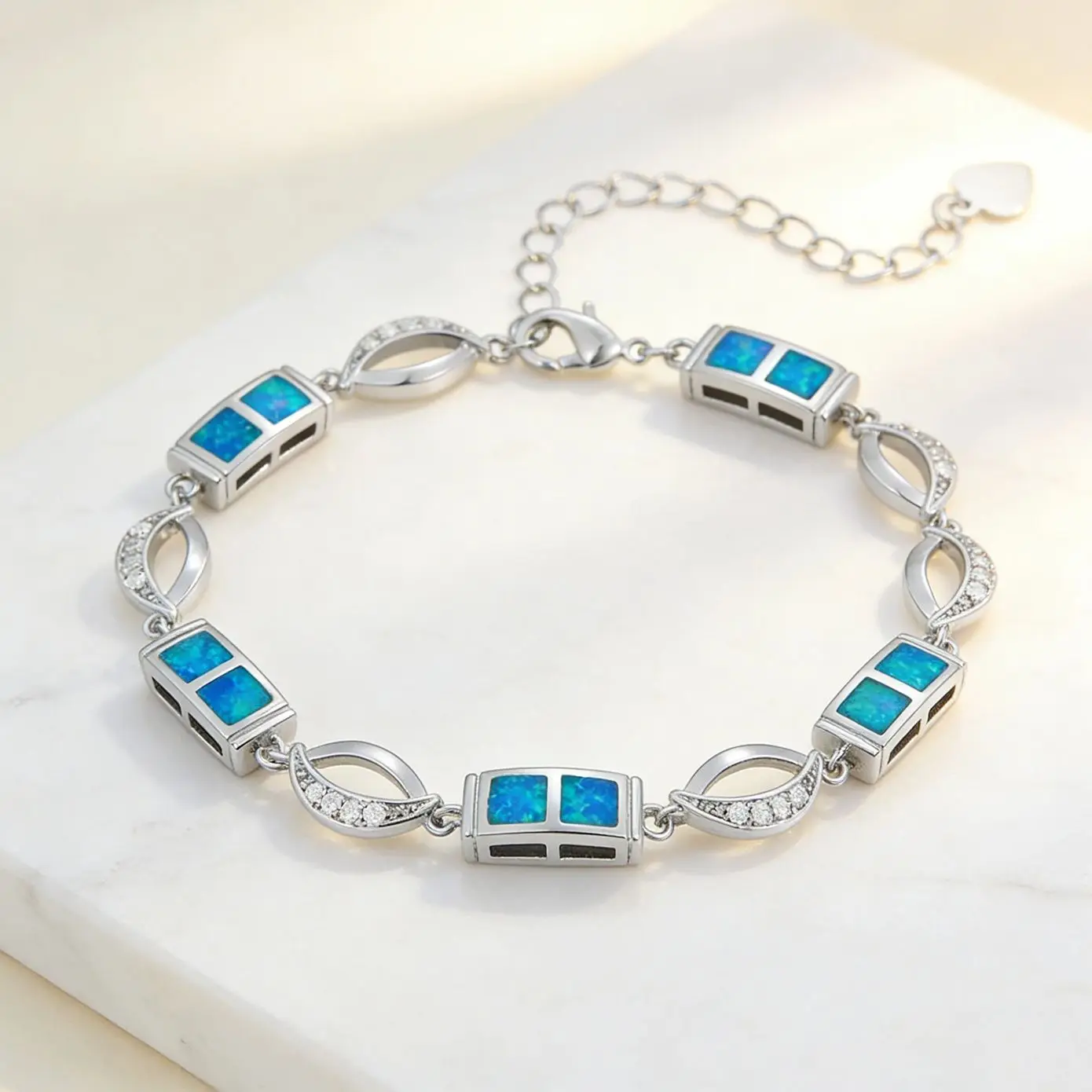 

Свадебный браслет с двойным квадратным опалом синего цвета, роскошный, серебристого цвета, с акцентами из кубического циркония, идеально подходит в качестве подарка для гостей на свадьбу или подружек невесты.