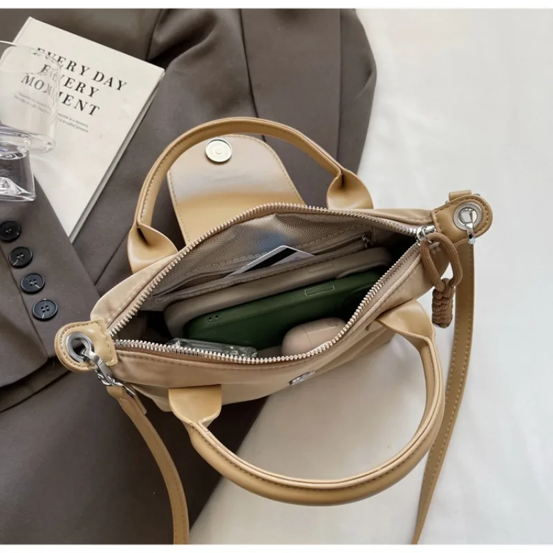 

Women Waterproof Oxford Geometric Handbag Lightweight Unique Dumpling Bag Convertible to Crossbody Shoulder Tote Colorful Purse