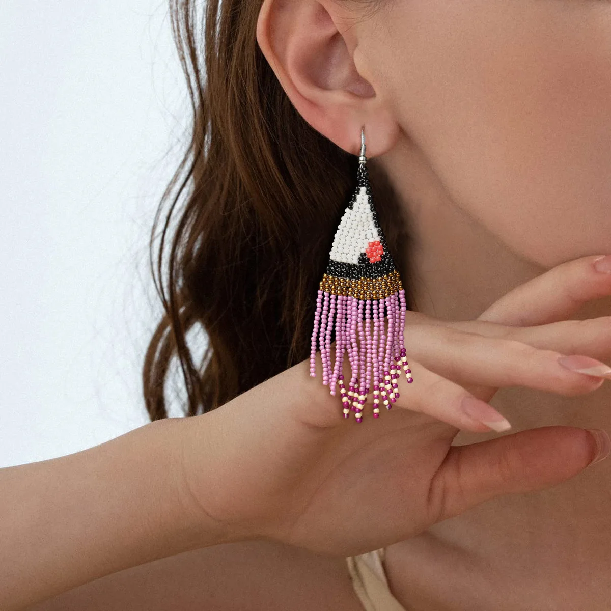 Beaded earrings Tassel Geometry Design Originality Hand knitting Bohemia Alloy Tide Simple Rice bead earrings