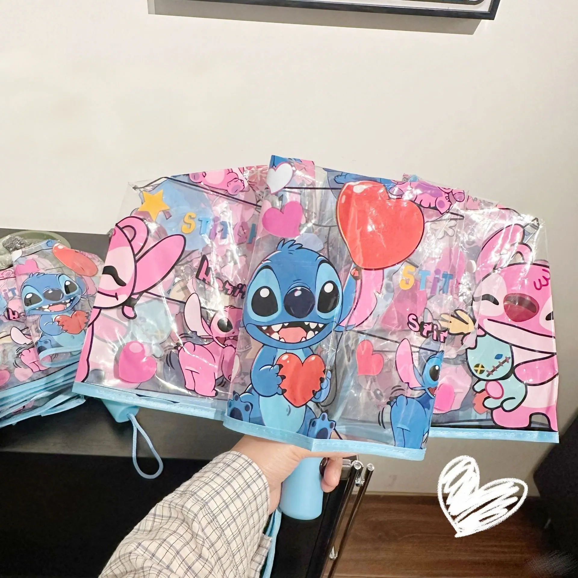 Płaszcz przeciwdeszczowy Stitch 2025 Parasol Przezroczysty Disney Anime Hybrydowy Design Lekki Przenośny Ochrona Przed Deszczem Dorosłych Prezent Gorąca Wyprzedaż