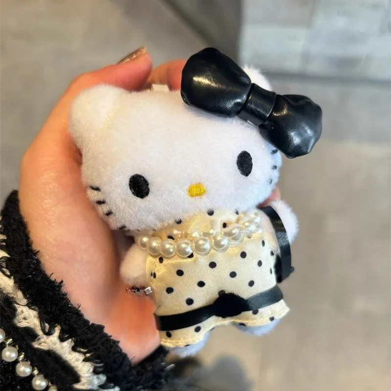 Hello Kitty Plüschtiere, echter Miniso-Cartoon, niedlicher mittlerer alter Stil, reiche Frau, Puppe, Plüsch-Schlüsselanhänger, Anhänger, Dekoration, Geschenk