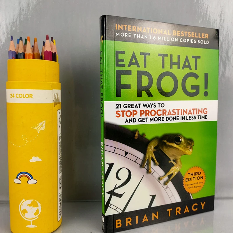 

Книга с вдохновляющими мотивами Eat That Frog, 21 способ остановить прокрастинацию, правила управления временем