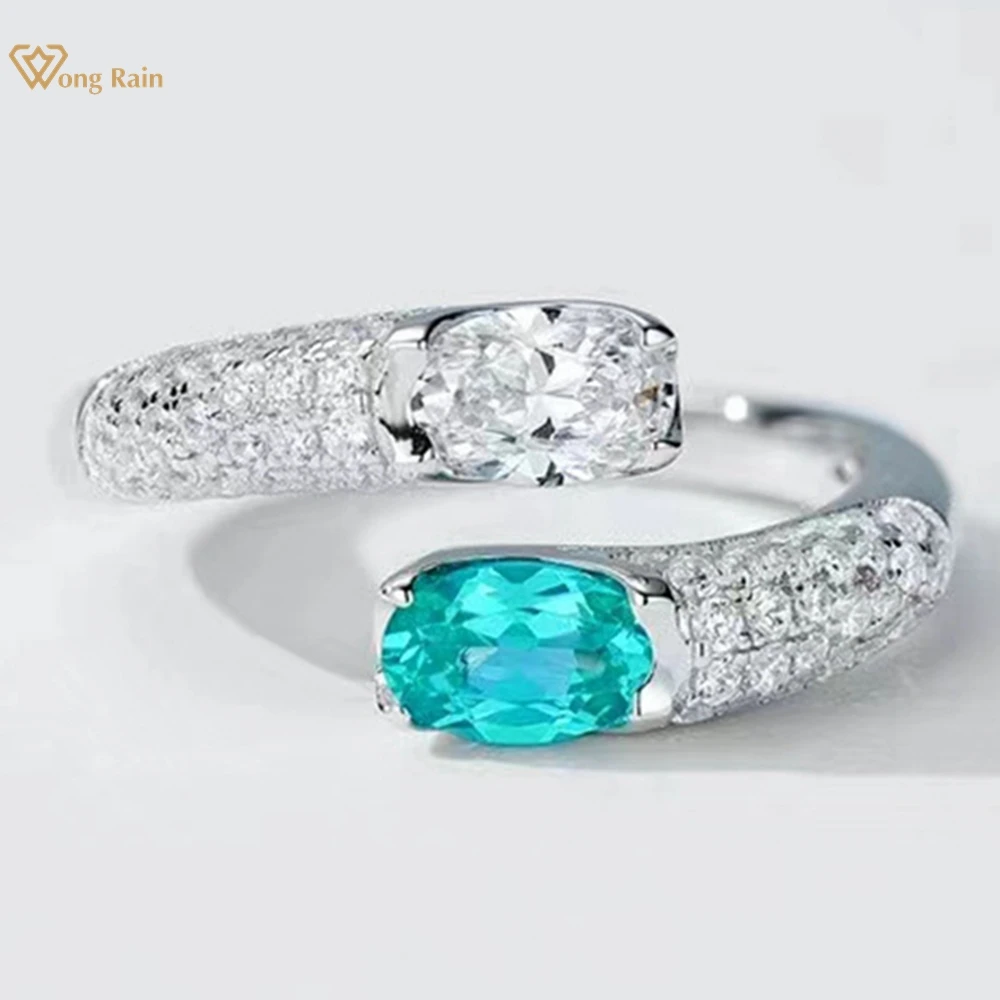 

Wong Rain 100% 925 Sterling Silver Sparkling Oval Cut Paraiba Tourmaline High Carbon Diamond Gems Open Ring for Women Jewelry