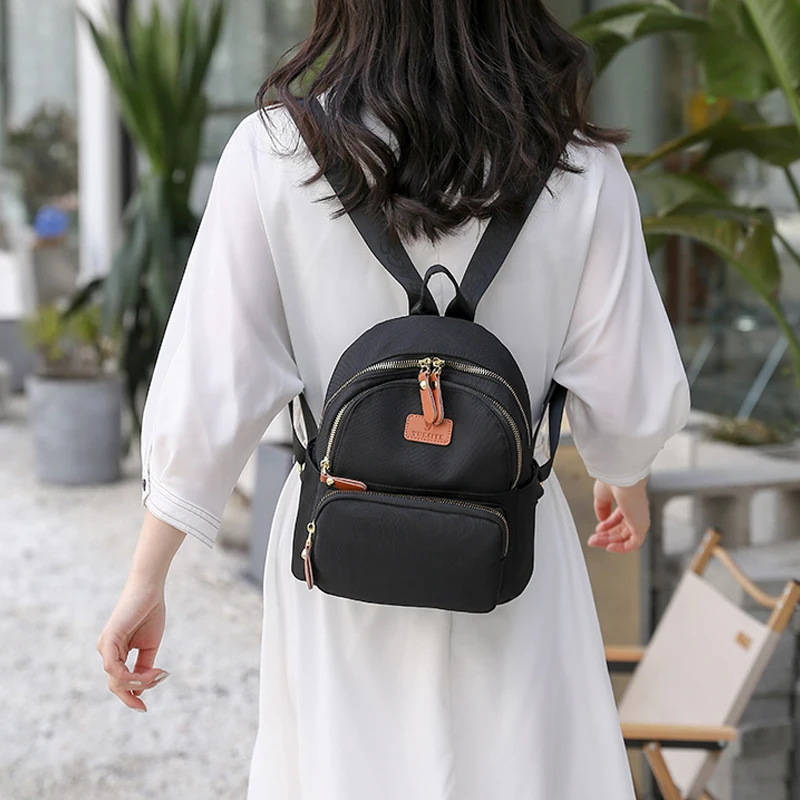 Simple Designer Women Small Travel Backpack High Quality Soft Oxford Women Shoulder Bag Fashion Girls Schoolbag Mochila Escolar