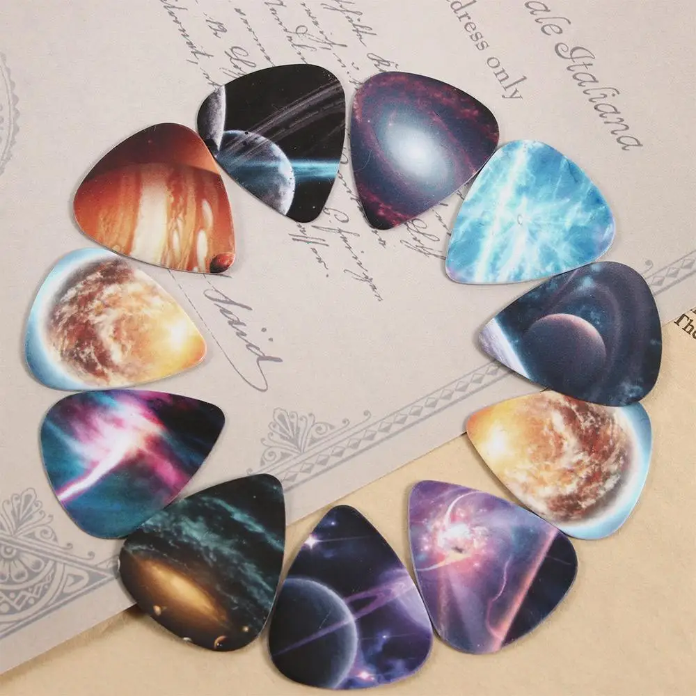 10pcs/Lot 0.71mm thickness Vastness of the universe Star guitar picks pattern guitar strap guitar parts Guitar Accessories