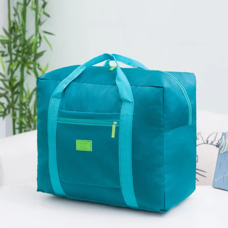 Bolsa de viaje plegable de alta capacidad para hombres y mujeres, bolsa de lona impermeable de nailon, organizador de ropa de mano, Cubo de embalaje