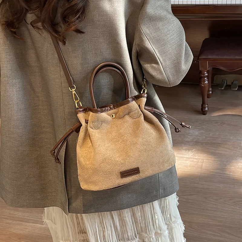 حقيبة دلو كلاسيكية لعام 2025، محفظة ذات مقبض علوي للنساء، حقيبة كروس عصرية للركاب، حقيبة متعددة الاستخدامات من اليوم إلى الليل، محكم #1