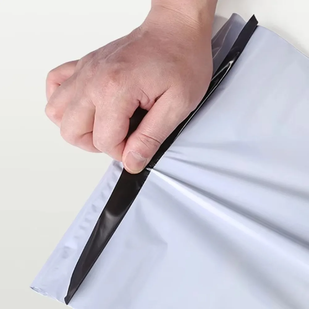 100 قطعة حقيبة التعبئة والتغليف ذاتية اللصق مقاوم للماء اللوجستية السريعة مختومة حقيبة البريد السريع ختم الغبار حقيبة التوصيل