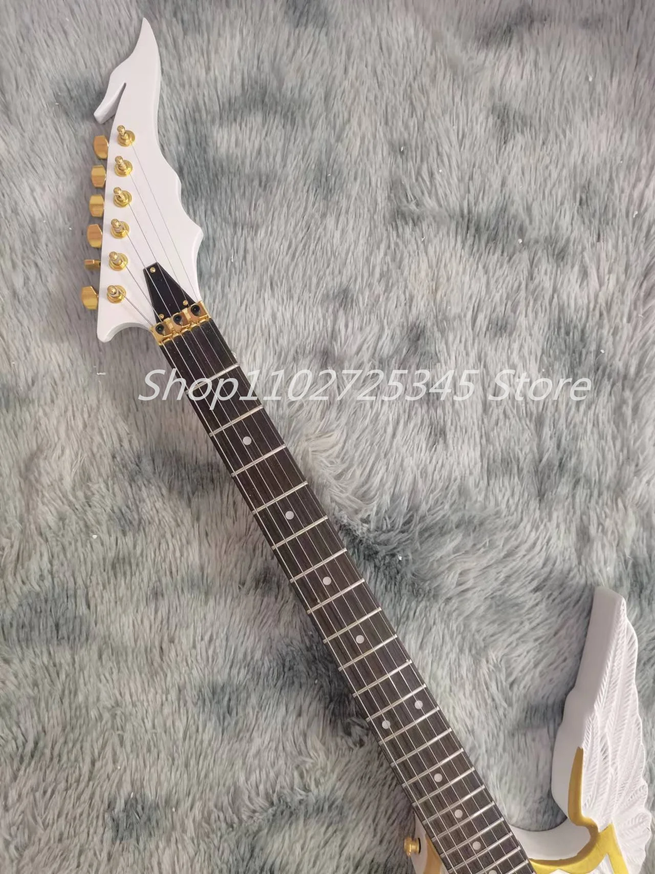 6-string guitar, rosewood fingerboard, gold accessory tremolo system, seller to bear shipping cost