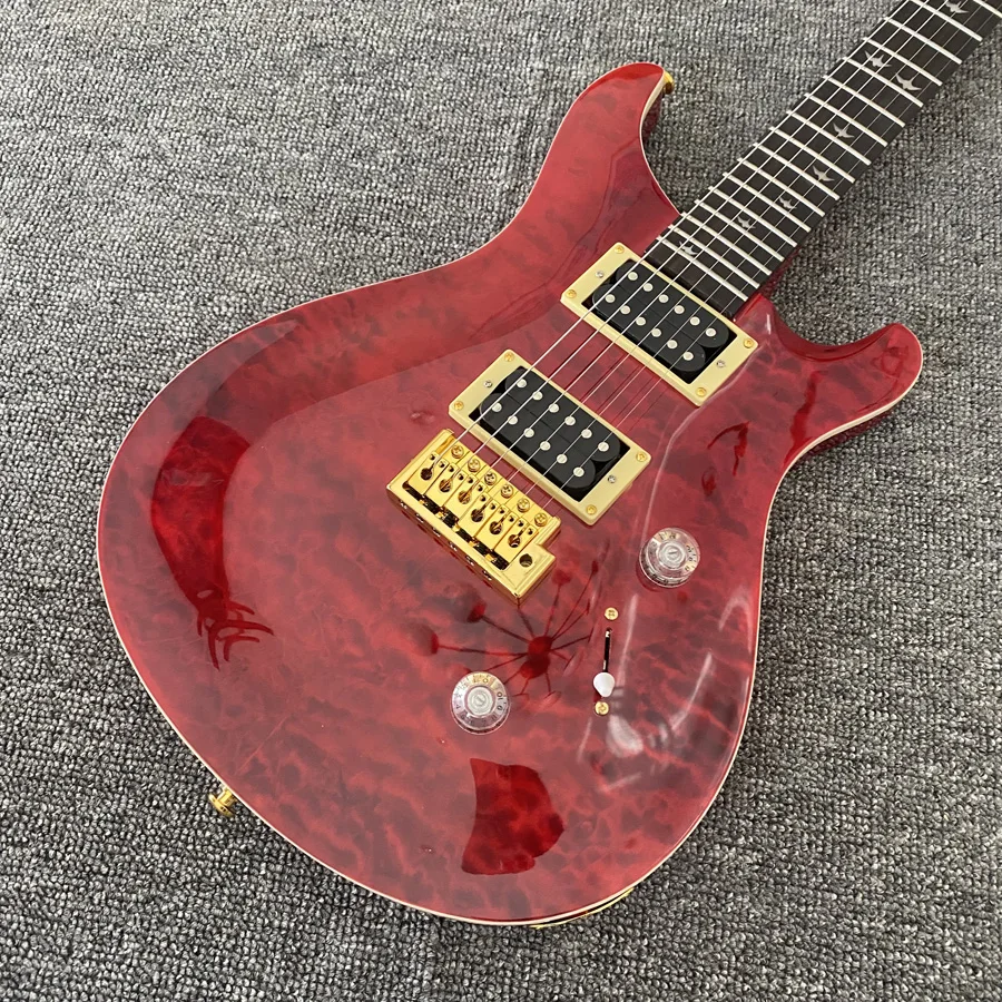 High quality electric guitar, wine red floral finish, rosewood fingerboard, gold hardware, vibrato system, 2 pickups