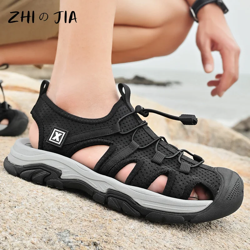 أحذية شاطئ مجوفة صيفية قابلة للتنفس للرجال صنادل رياضية خارجية مانعة للانزلاق أحذية كاجوال كبيرة مريحة سهلة الارتداء أحذية مسطحة