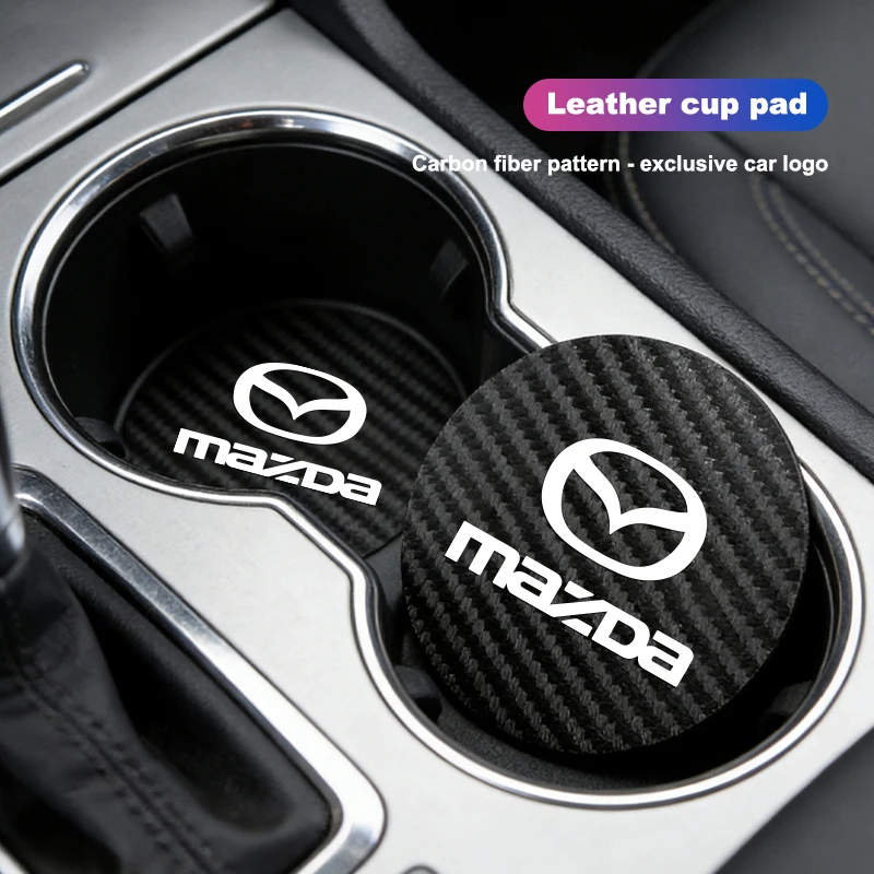 

Комплект из 2 кожаных подкладок для подстаканников в автомобиль для Mazda 2, 6, CX-5, CX-80, CX-70, CX-90, MX-30, CX-60, CX-50, CX-30, BT-50, e-TPV, CX-3, CX-8