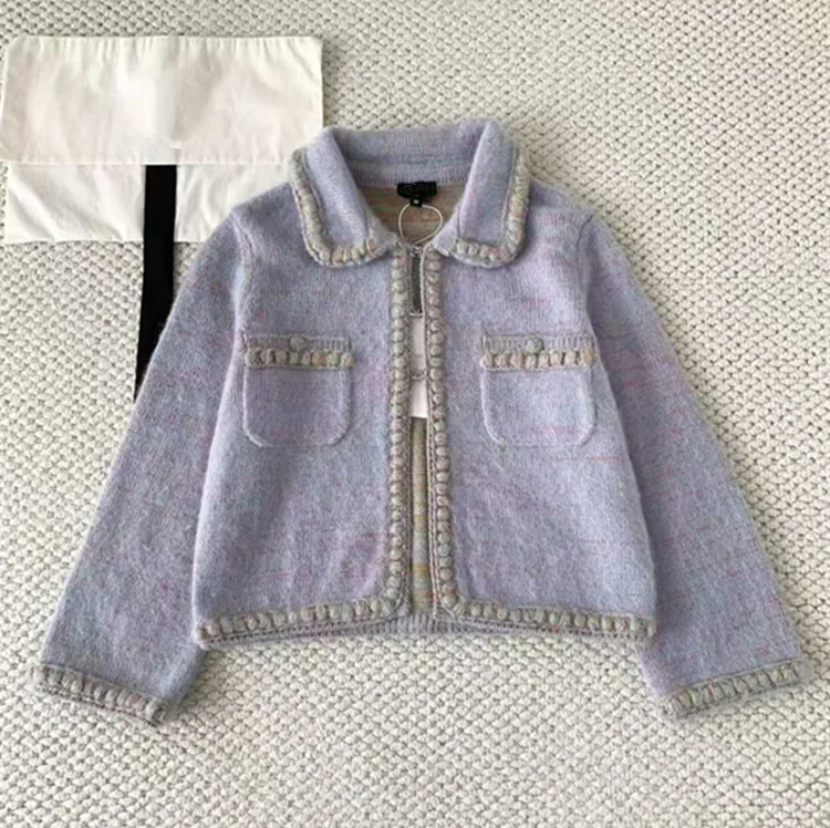 

Индивидуальные новые зимние стили женской одежды 2025 года в европейском и американском стиле, кашемировый вязаный кардиган с длинными рукавами и лацканами, свитер