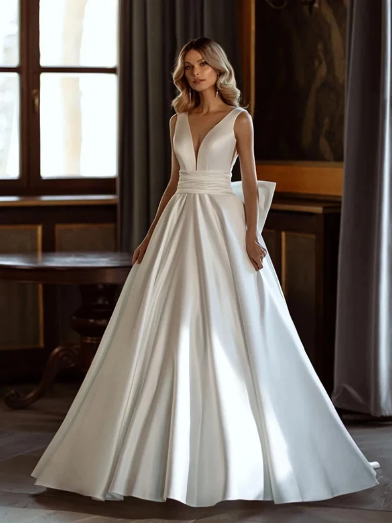 Abiti da sposa di moda moderna abiti da sposa in raso lucido fiocco decorare abito semplice con scollo a v Backless senza maniche Vestidos De Novia