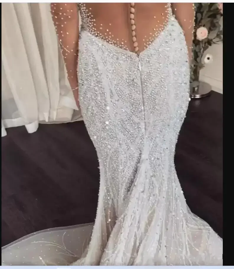 Customized Full Heavy Crystal Beaded Mermaid Wedding DressSee Through Long Sleeves African Plus Size Buttons Back Bridal Gown