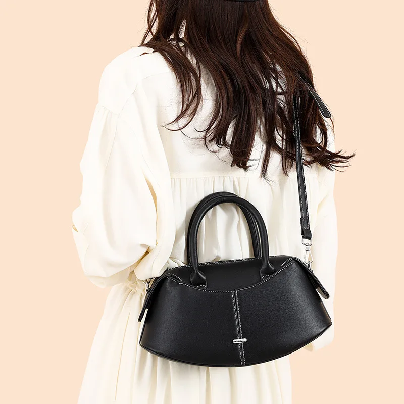 Classic Leather Messenger Bag For Women, Spacious Design With Secure Zipper, By Luxury Brand, Ideal For Professionals