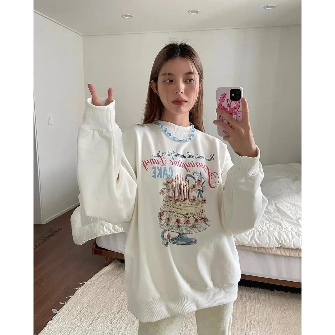 

In The Autumn and Winter of 2025, A Printed European and American Sweet and Spicy Loose Versatile Round-neck Hoodie for Women