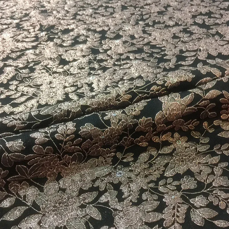 

CyThree-dimensional embossed gilded jacquard fabric is used as the for dresses windbreakers and brocade garments