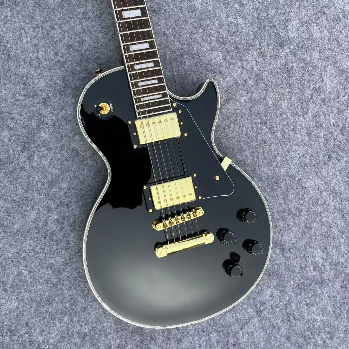 Guitarra eléctrica personalizada, color negro, herrajes dorados, diapasón de palisandro, fabricada en China, envío gratis