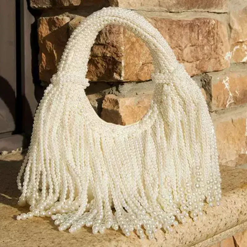 2026 New Vintage Heavy Industry Handmade Weaving String Pearl tassel Dumpling Bag Tote Banquet Handbag