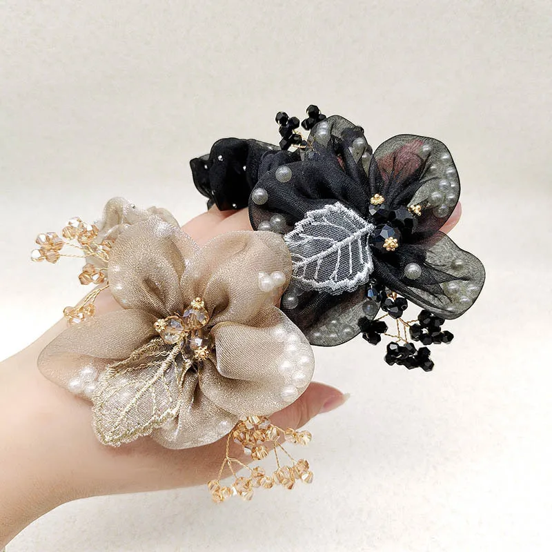 

Ougensha high-end large intestine hair tie, new leather band women's hair tie, hair flower, summer headwear