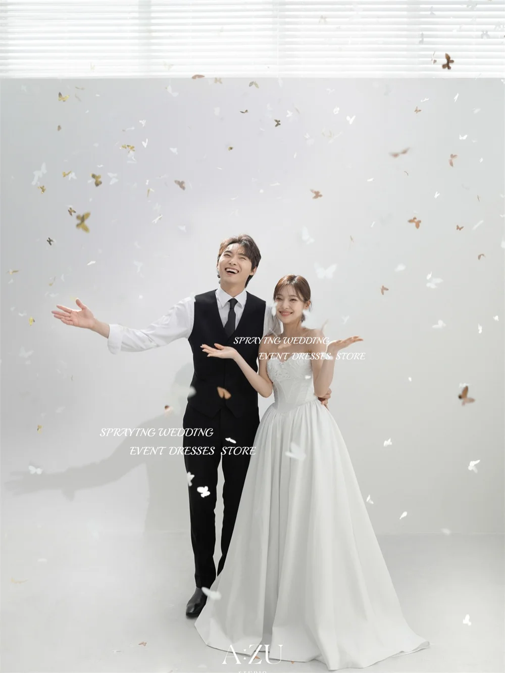 رش فستان زفاف أنيق من الساتان العاجي كوريا صورة تبادل لاطلاق النار على شكل قلب بدون أكمام خط طويل زي العرائس مشد مخصص