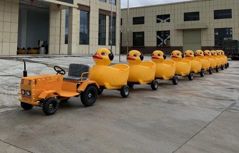 Big yellow duck can pull outdoor farm scenic beach three-person oil barrel small train, personally sightseeing train