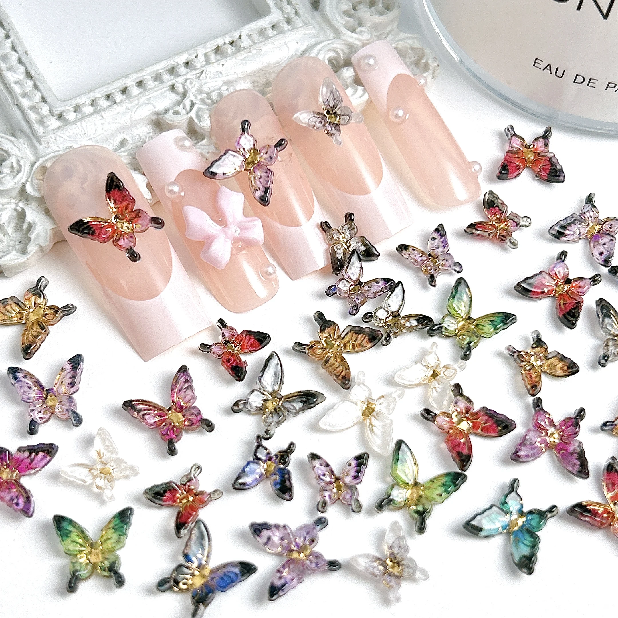 ชาร์มติดเล็บรูปผีเสื้อเรซิ่นวินเทจหลากสี 20 ชิ้น ตกแต่งเล็บลายผีเสื้อ 3 มิติ สไตล์คลาสสิก ดีไซน์ใหม่ สำหรับตกแต่งเล็บ DIY