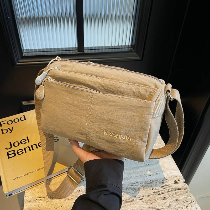 

Новая женская сумка-кроссбоди 2025 года, водонепроницаемая, ультралегкая, тканевая, многослойная, маленькая квадратная сумка, унисекс, на одно плечо