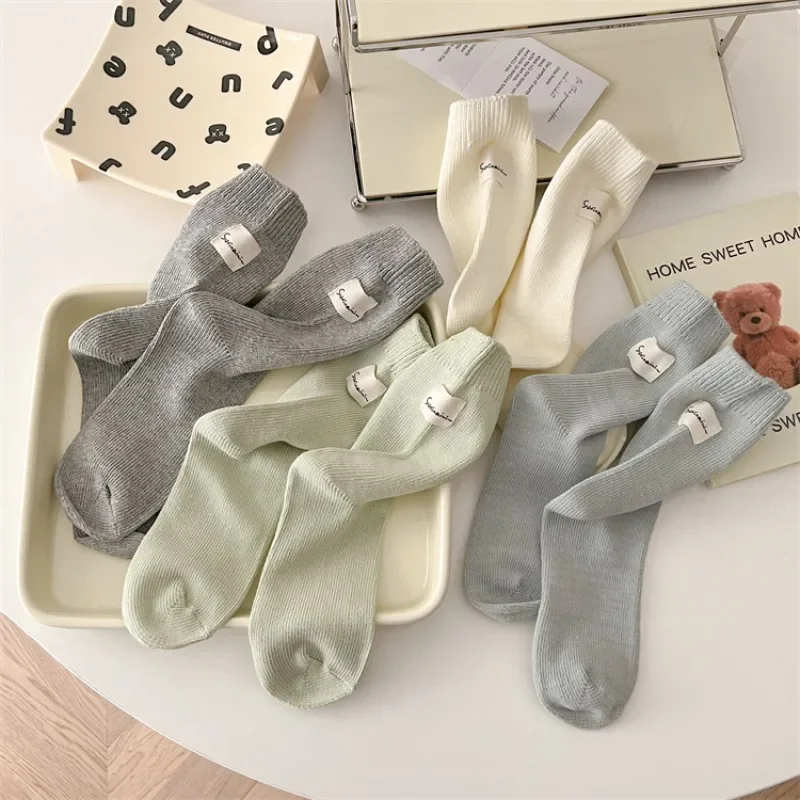 Autumn Winter Women Socks Korean Japanese Fashion Solid Color Black White Gray Middle Tube Socks Women Cotton Knitted Long Socks