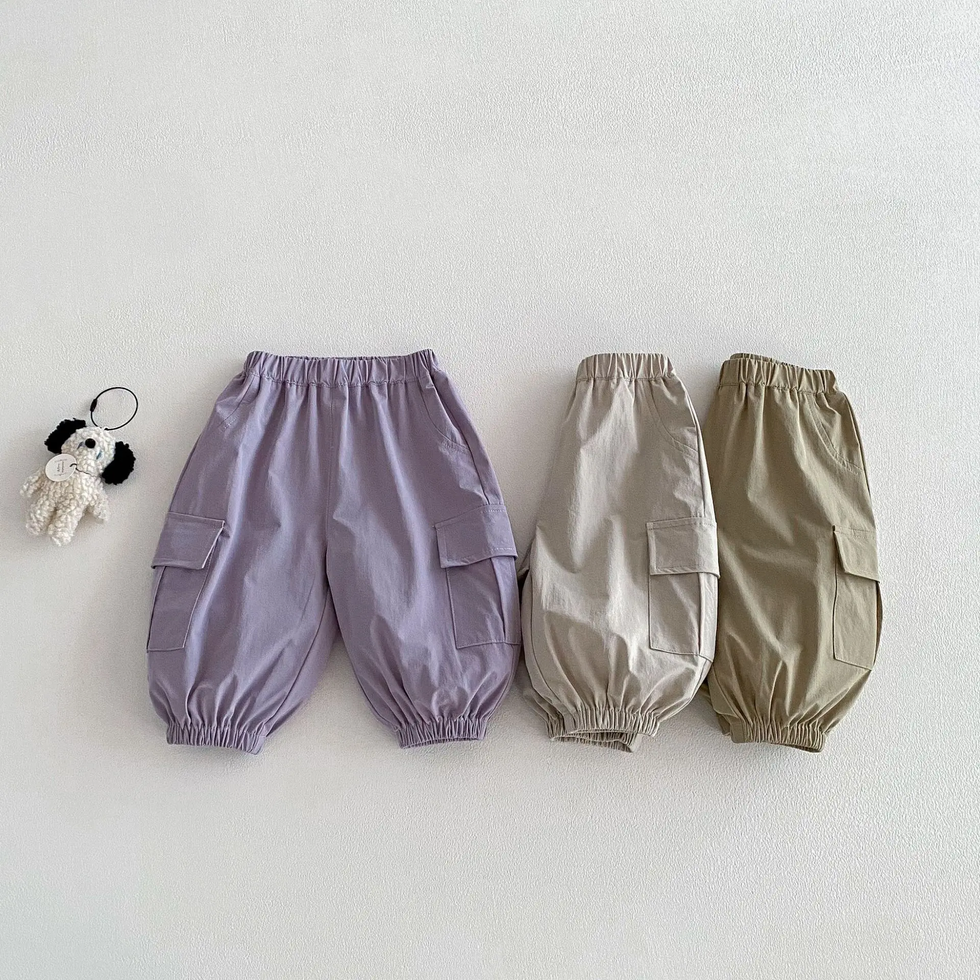 

2026 Spring New Kids Pants Solid Cargo Pants Loose Style Boys Trousers Side Pocket Girls Pants