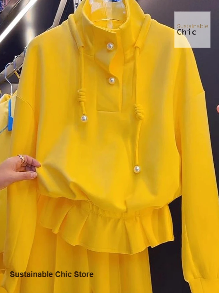 

French yellow collar pullover sweater women's autumn and winter new high-grade temperament drawstring Pearl button loose top