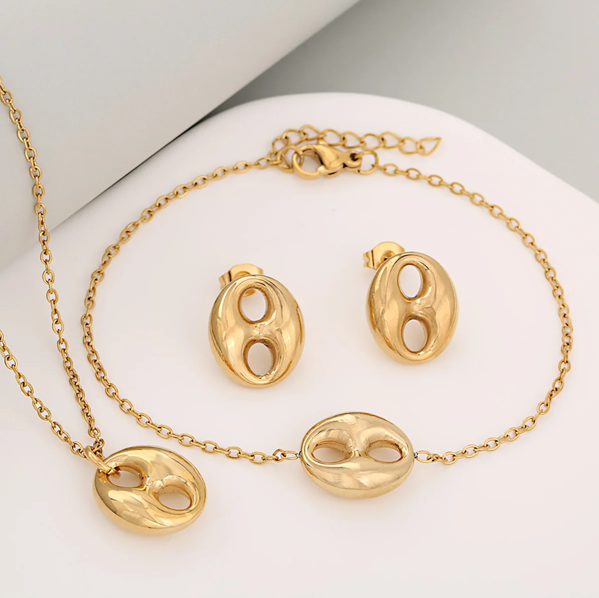 

Sweet Fresh Hollow Pig Nose Coffee Bean Stainless Steel Fashion Versatile Bracelet Necklace Earrings Set for Women