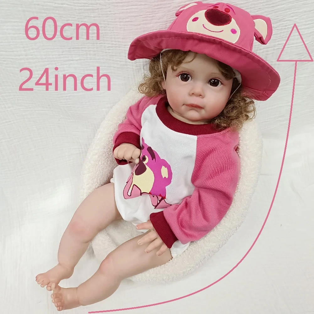 

24-дюймовая виниловая кукла реборн для девочек | Редкая супер реалистичная игрушка, розовый мультяшный наряд, голубые глаза, длинные вьющиеся волосы, позитивные,