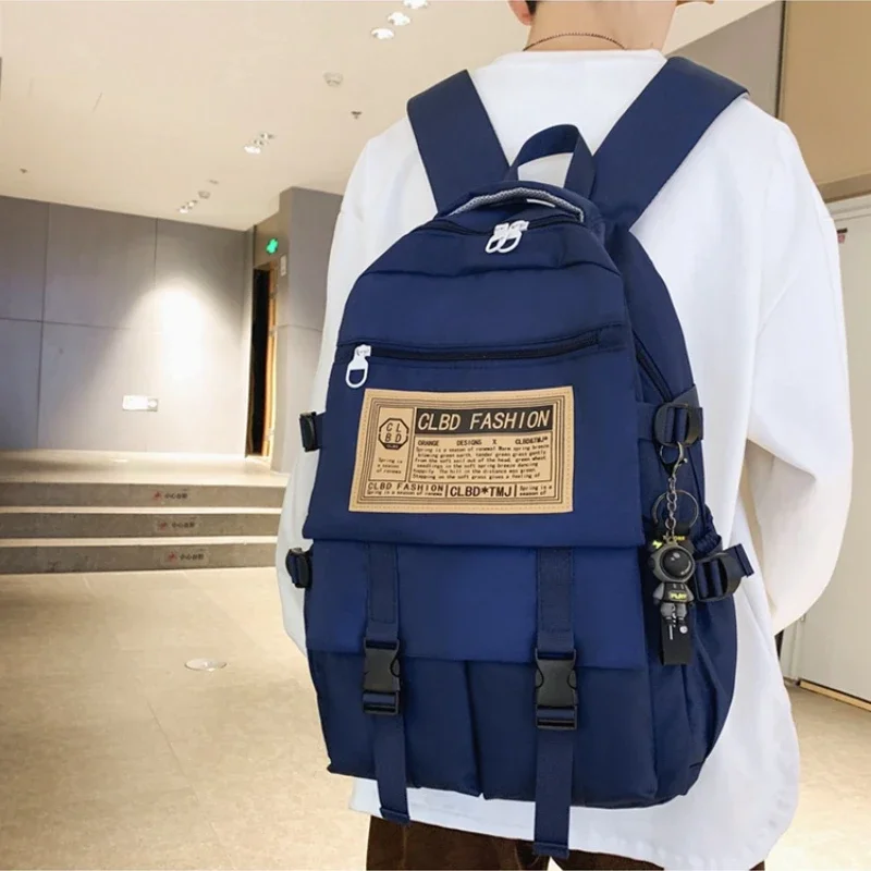 Men's and Women's Fashion Backpack High School Campus School Bag Large Capacity Leisure Travel Bag Optional Pendant