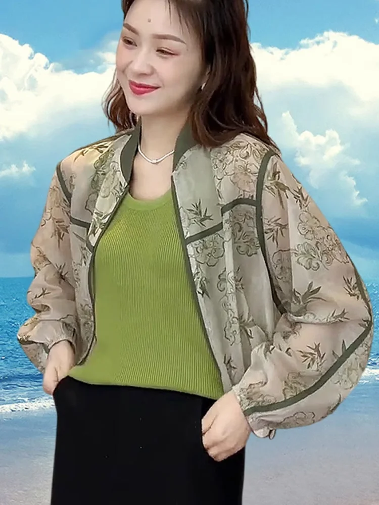 

Женская летняя новинка: легкая дышащая укороченная куртка из ледяного шелка с принтом, защитой от солнца и воротником на пуговицах