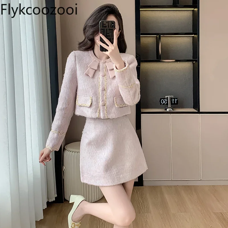 

Fashion pink autumn and winter temperament all-in-one bow set 2024 Autumn and winter gentle wind socialite niche two-piece set