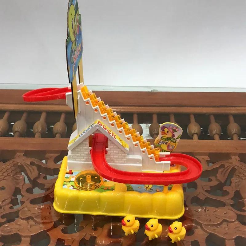 ODILO 1PCS Cartoon Mini Electric Little Duck Climb The Stairs Track Slide Sound and Light Music Child Toy