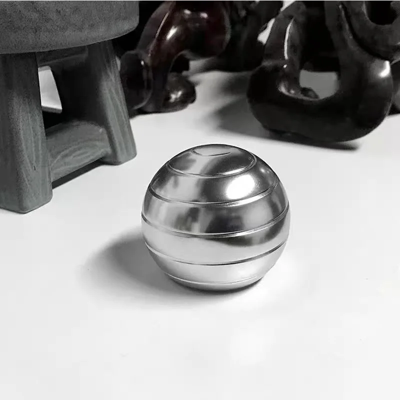 Novelty Office Gifts Kinetic Desk Toy Optical Illusion Metal Fidget Spinning Ball Large 55MM  Stress Relief For Anxiety Adults