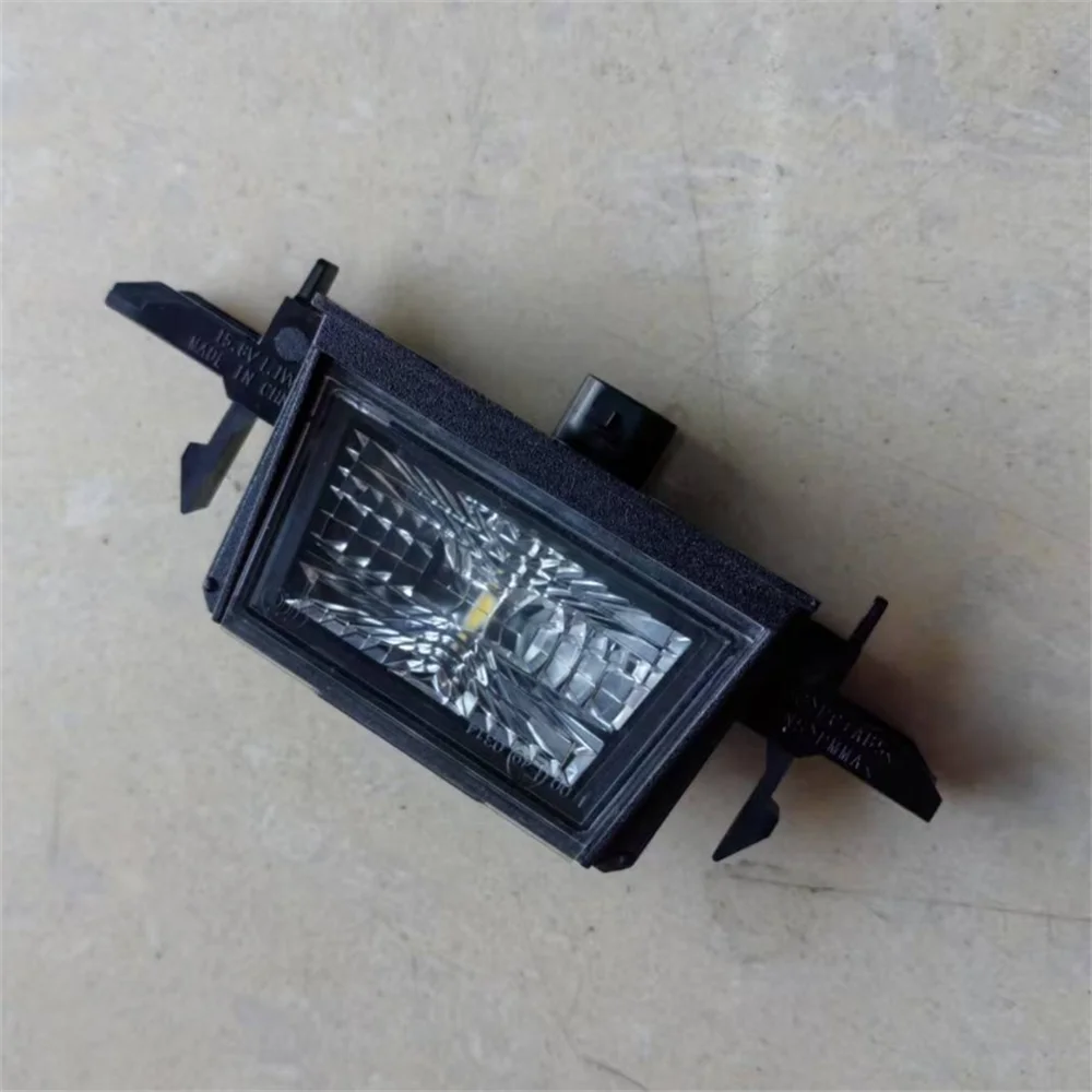 

Подходит для обновленной подсветки номерного знака Tesla Model Y 2025 года L=R 1906102-00-B.