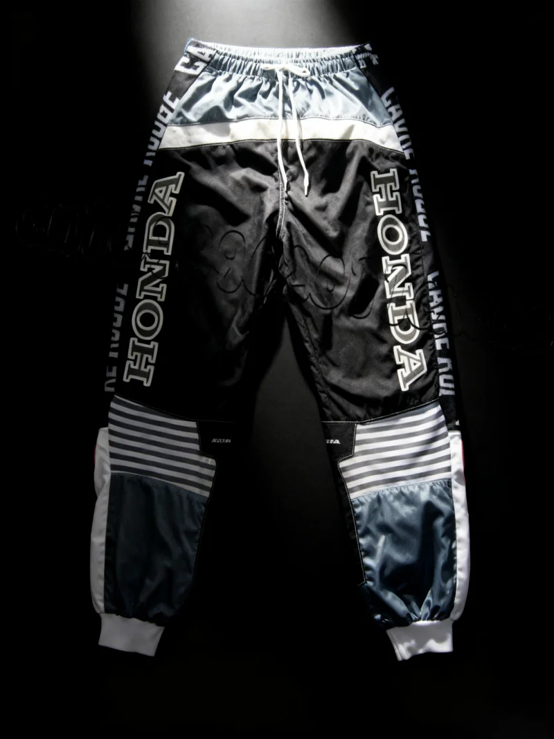 25/26 Honda Venta caliente negro moda High Street pantalones casuales hombres motocicleta bicicleta de carreras pantalones de montaña de secado rápido