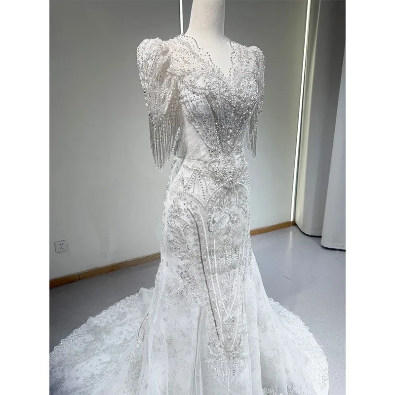 

A new heavy-duty lace-like drawstring dress with fishtail main fabric and light gauze backless design for going out