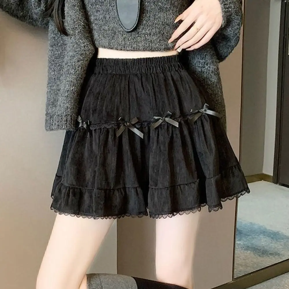 Minigonna corta da ragazza a vita alta con pantaloni di sicurezza Gonna a trapezio con fiocco con volant Abito da torta Minigonne a pieghe in pizzo allentato Lady