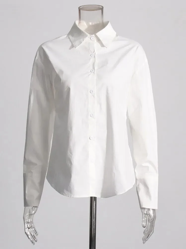 TWOTWINSTYLE Backless Patchwork Lace Up Blouse For Women Lapel Long Sleeve Spliced Button Minimalist Shirts Female Fashion New