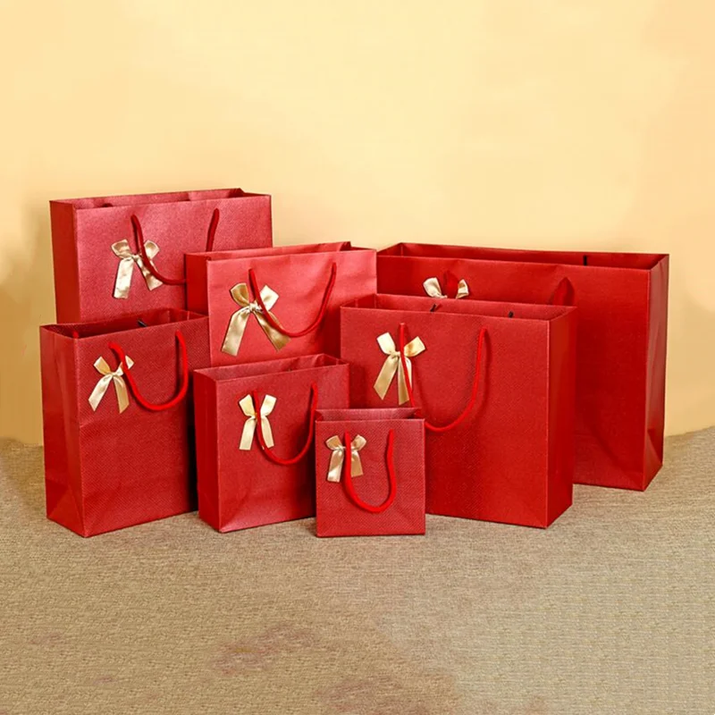 

Free Design 100PCS/LOT Wine Red Paper Bag/Paper Gift Packaging Bag Printed LOGO Factory Wholesale