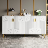 White sideboard (152 x 40 x 75 cm) with unique wave design and golden handles and feet for an elegant dining area