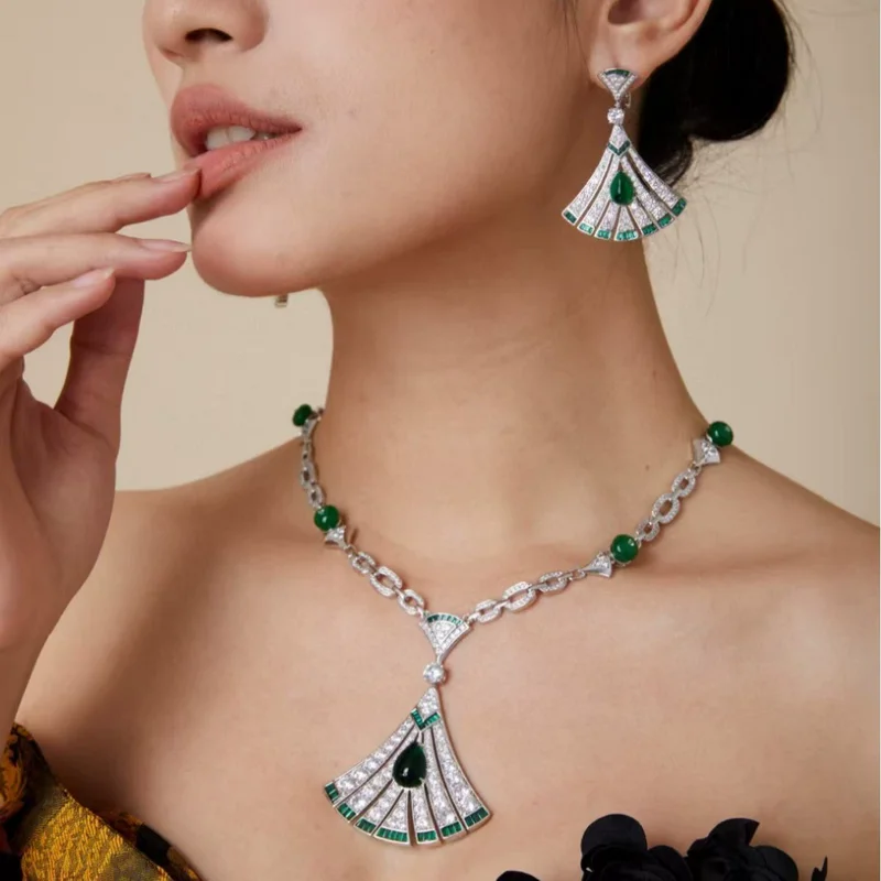 

Дизайнерская коллекция, стильное ожерелье, серьги, женские женские инкрустации кубическим цирконом, веерообразный кулон, позолоченные комплекты ювелирных изделий